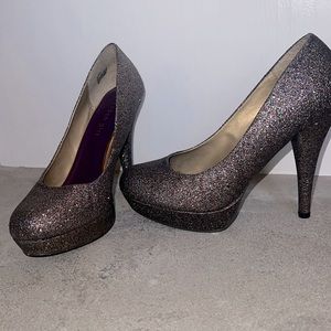 Size 10, sequence heels. Lightly worn.